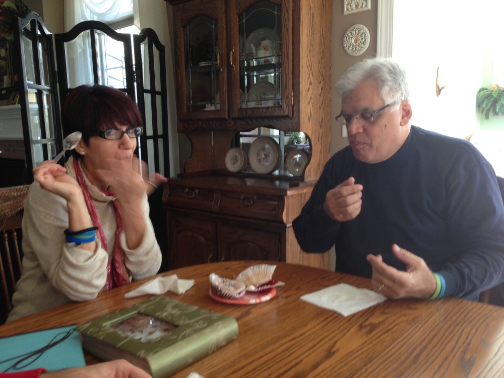 Phil's Mom and Dad enjoying the cake