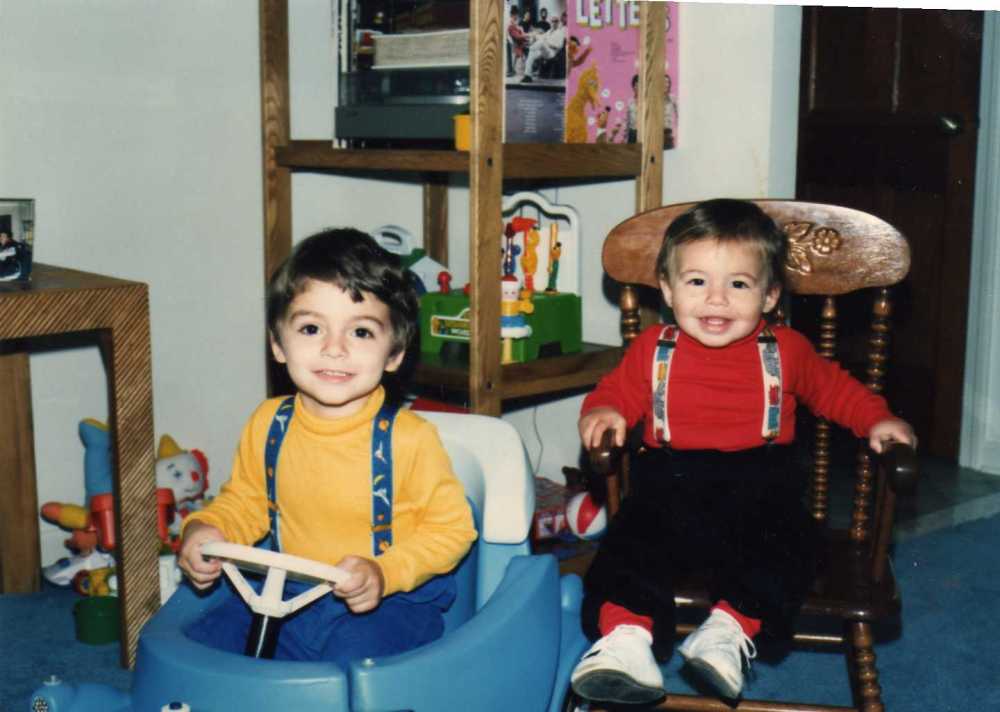 Phil and Nick wearing matching outfits