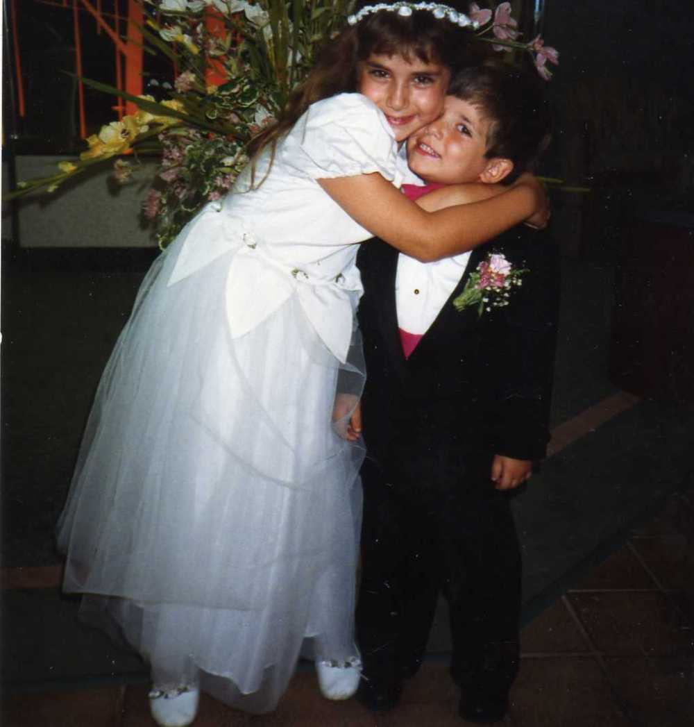 Alexander and I as the ring bearer and flower girl at our cousins Mike and Sophia's wedding